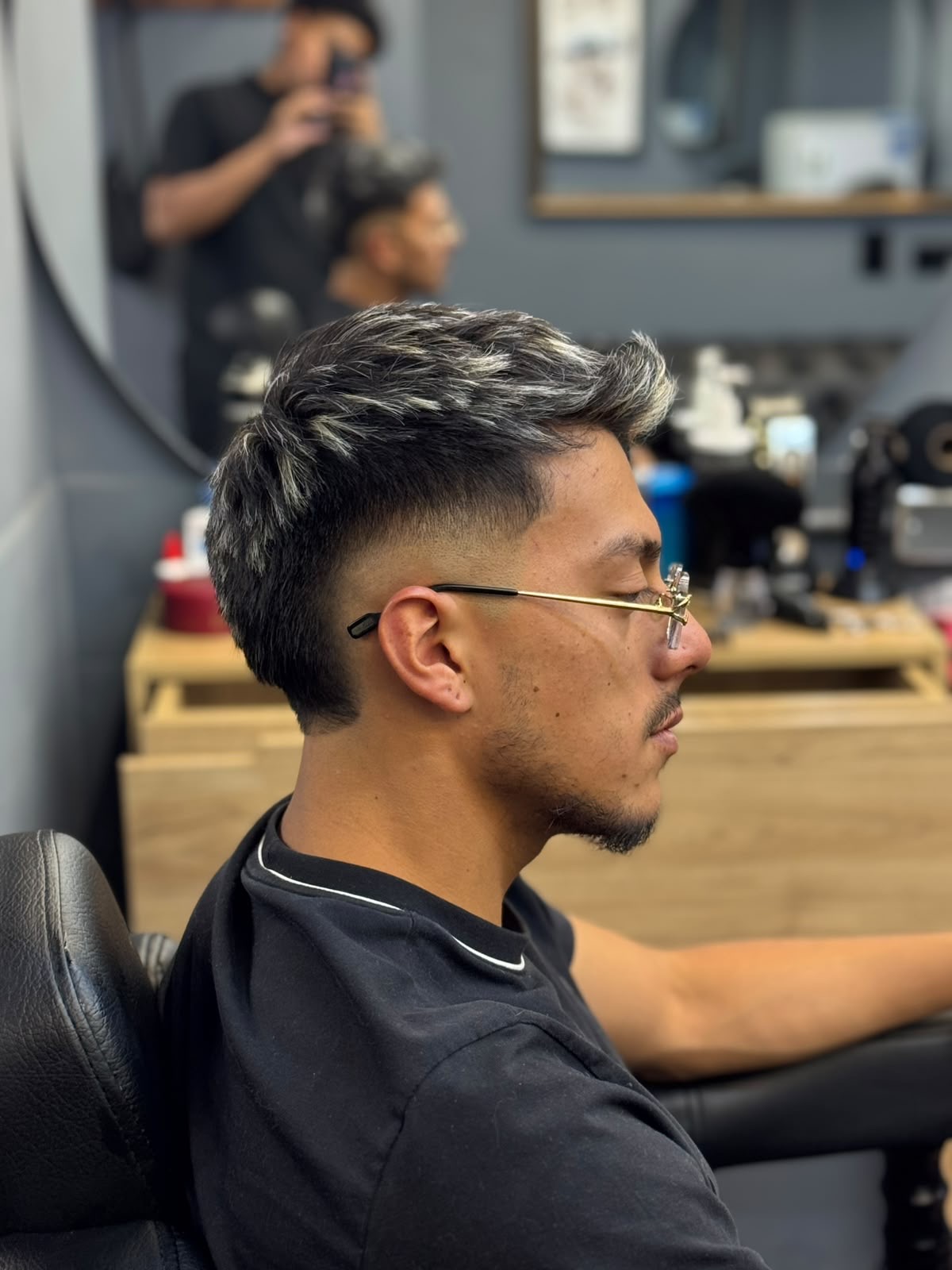 Barbero de Mr. Ortiz trabajando